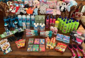 Collection of games, toiletries, pj's for foster kids games